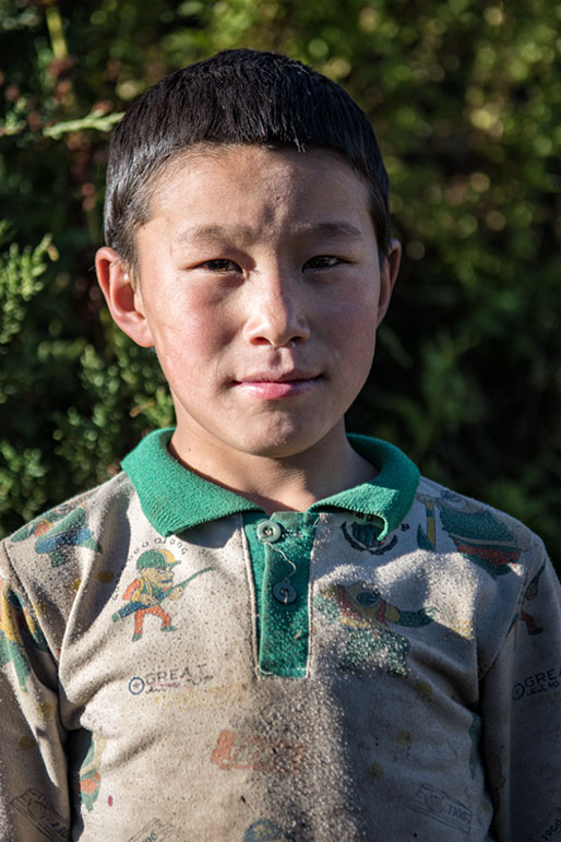 Portrait d'un jeune garçon à Laya, Bhoutan